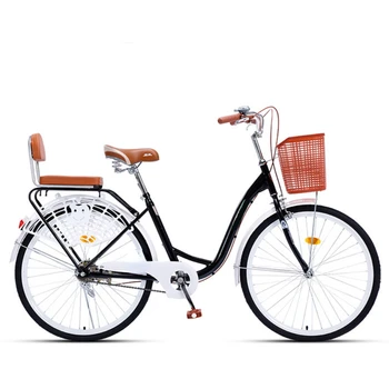 велосипед с задната седалка е старомодна ретро велосипеди за възрастни лек мотор градски велосипед