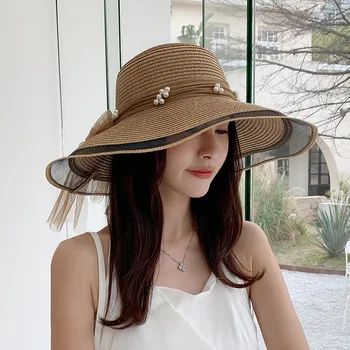 Лятна солнцезащитная сламена шапка, дамски шапки с перлената лента, елегантен рибарско капачка с голяма периферия и лък, модерни плажни шапки за почивка на море